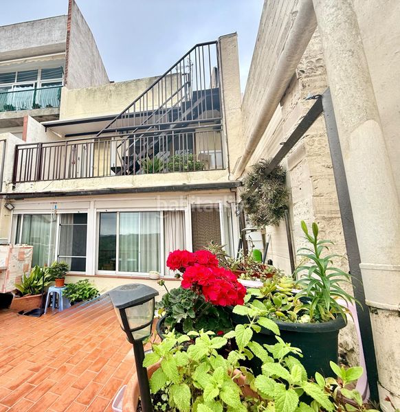 Foto a176318b-6b18-4565-bd4e-ea48beef0b1e. Casa adossada amb aparcament a Malgrat de Mar