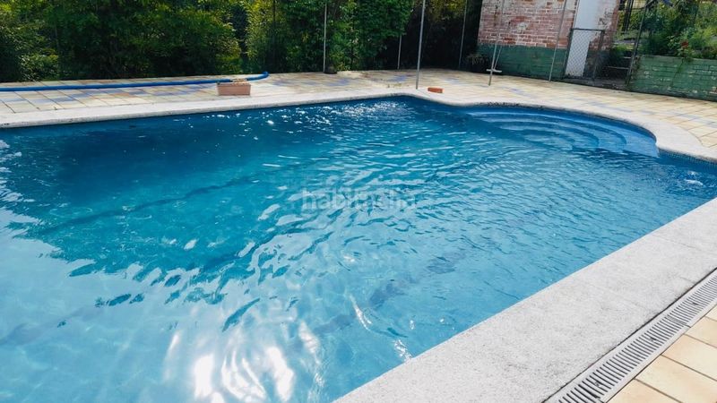 Foto 9d89d56a-8153-4a26-b717-e2d406ae1bae. Casa amb aparcament piscina a Teo