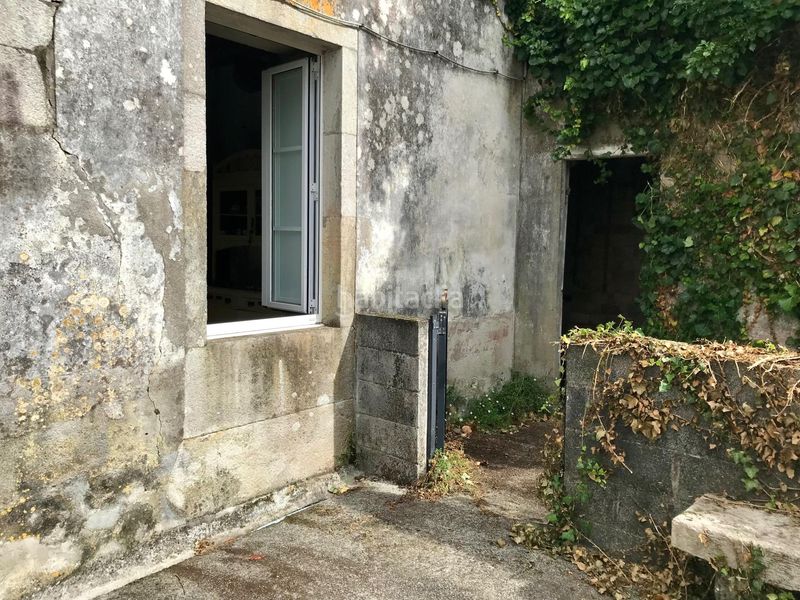 Foto 1bce3f19-5d10-4649-aeb4-31e075af3388. Casa aparellada amb aparcament a Outes