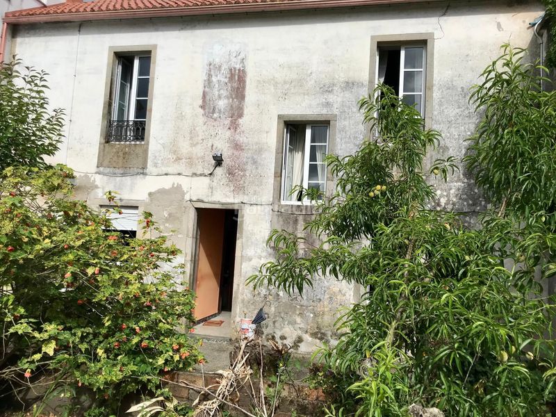 Foto 1e3ed72b-5ea8-4e89-b8fd-5d695031963a. Casa aparellada amb aparcament a Outes