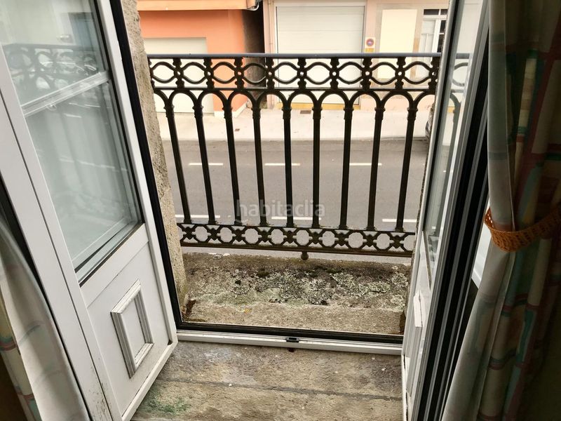 Foto 68cd178d-1bd4-475d-a26d-0ec41eaa4aec. Casa aparellada amb aparcament a Outes