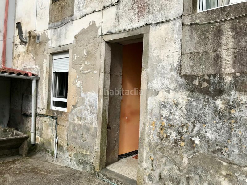 Foto b353d8ca-491b-4d19-a029-c2bd44a0b905. Casa aparellada amb aparcament a Outes