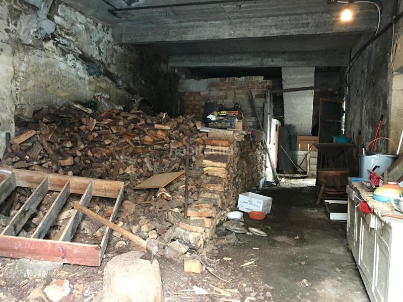Foto c3df6626-6fde-4a2e-93a7-8ed0670f9fb7. Casa aparellada amb aparcament a Outes