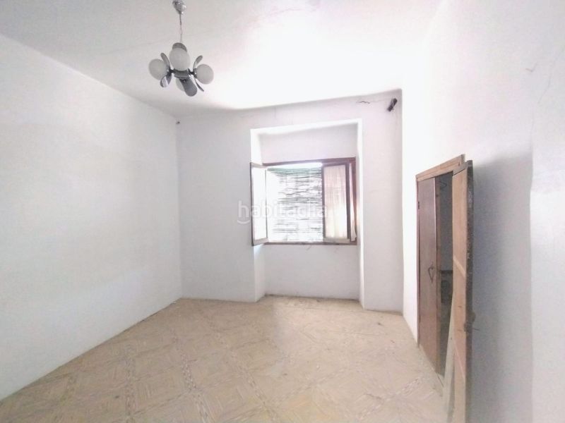 Foto 1f16edd1-511f-4790-b816-82e65e92a2a7. Casa aparellada amb aparcament a Campo de Criptana