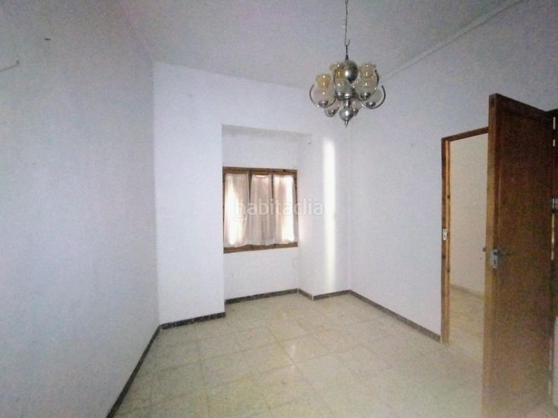 Foto 2a7a4c07-d223-43b6-8016-f86bbe044a2c. Casa aparellada amb aparcament a Campo de Criptana