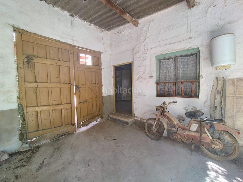 Foto 391a26e9-fa87-4d3e-b43a-dd1b3eed3e4c. Casa aparellada amb aparcament a Campo de Criptana