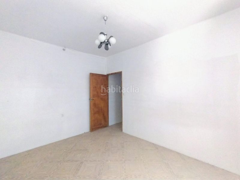 Foto 3e971d5b-d42c-4c7a-9198-98eb1adfab63. Casa aparellada amb aparcament a Campo de Criptana