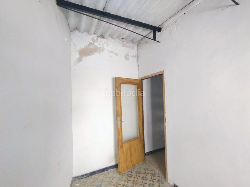 Foto 780e89a7-c9f0-4c7d-880b-02aa2078efb3. Casa aparellada amb aparcament a Campo de Criptana
