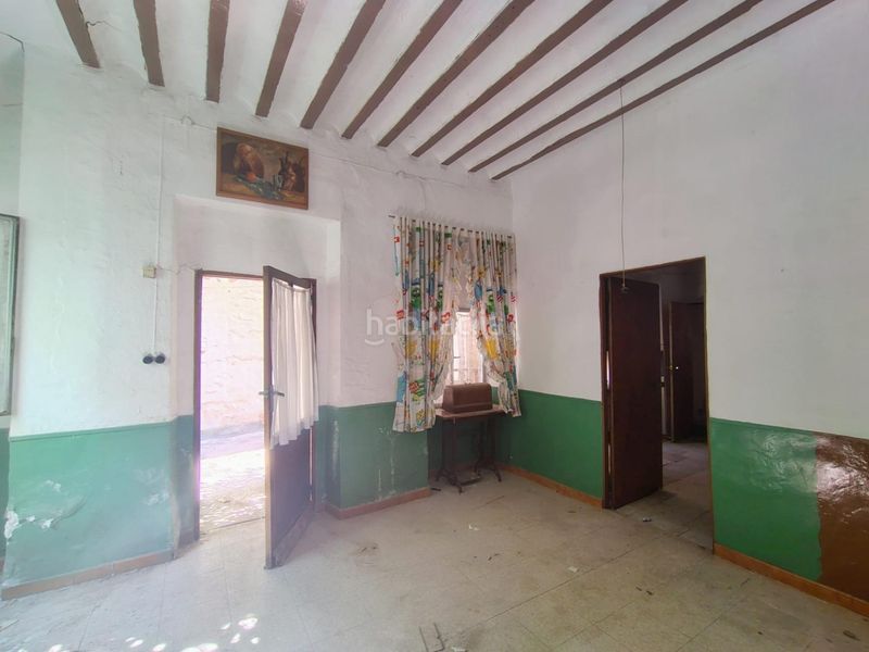 Foto c57e44ff-9c40-43c7-b316-587a50f21279. Casa pareada en Campo de Criptana