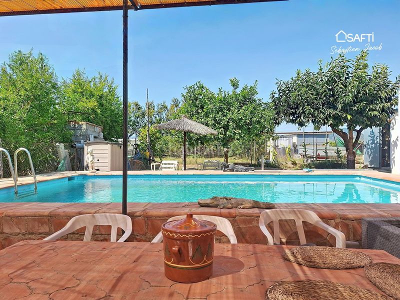 Foto f20eb40e-5592-4856-bca4-f32f0e0d80b1. Masia amb calefacció aparcament piscina a Oliva playa Oliva