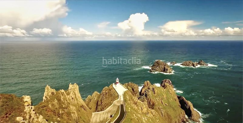 Foto cbe9cffa-6889-47a2-9f25-f13b94d0e2f0. Edifici a Cariño