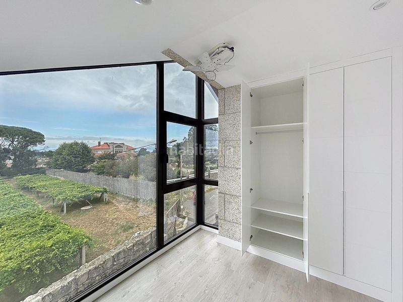 Foto a65c7d40-56a1-462b-8e79-2b57ed02d1bd. Casa amb calefacció aparcament a Cambados