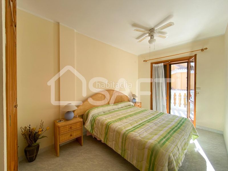 Foto fcfab93c-6f64-4a83-acd2-1aa99ebe32dd. Casa adossada amb aparcament piscina a El Perelló Sueca