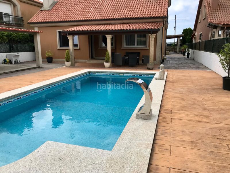 Foto 56eaa021-aed3-4bec-b48b-dc639c82c2f6. Casa amb calefacció aparcament piscina a Oleiros Ribeira