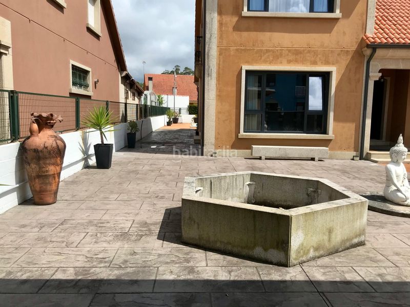 Foto 85df5386-8acc-44c5-bca8-4f952680f19f. Casa amb calefacció aparcament piscina a Oleiros Ribeira