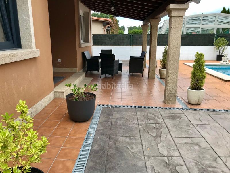Foto bc96de82-9549-4430-97b6-0e93e61b572c. Casa amb calefacció aparcament piscina a Oleiros Ribeira