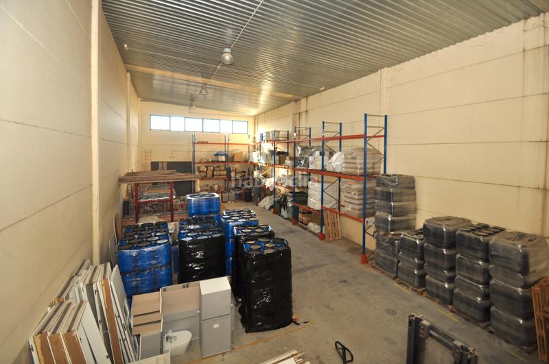 Foto 1933ecc6-2f33-484b-95c8-2626a915ffd8. Bâtiment à usage industriel avec chauffage dans Quer