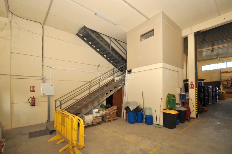 Foto 21974e99-e966-4c61-b2a9-607cd05188a3. Bâtiment à usage industriel avec chauffage dans Quer