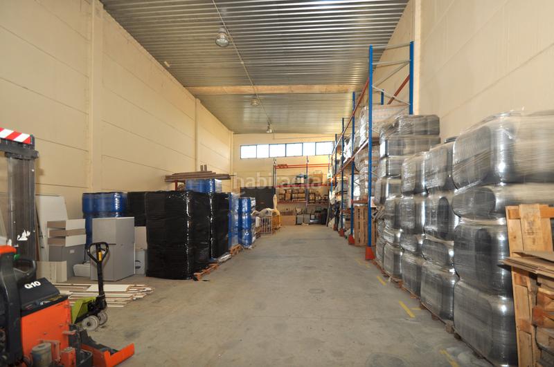 Foto 29883c69-4429-452f-83e4-7e0258acf2a7. Bâtiment à usage industriel avec chauffage dans Quer