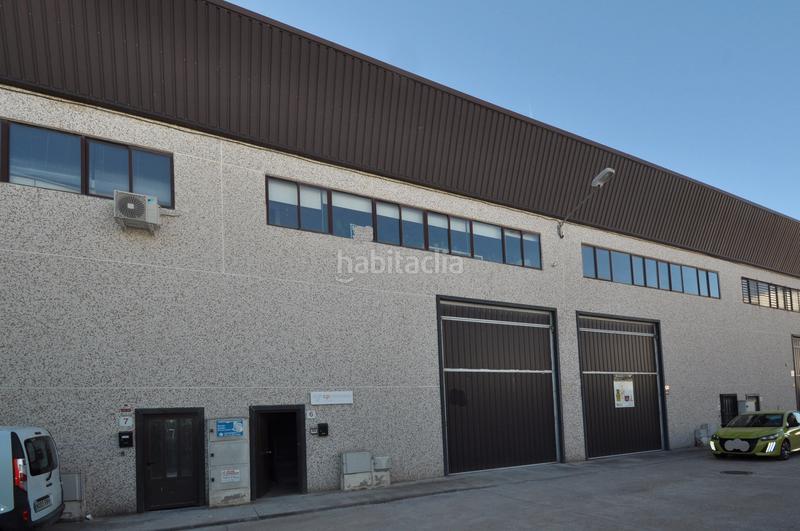 Foto d4760152-424c-44a7-87df-77c0fa2f9a34. Bâtiment à usage industriel avec chauffage dans Quer