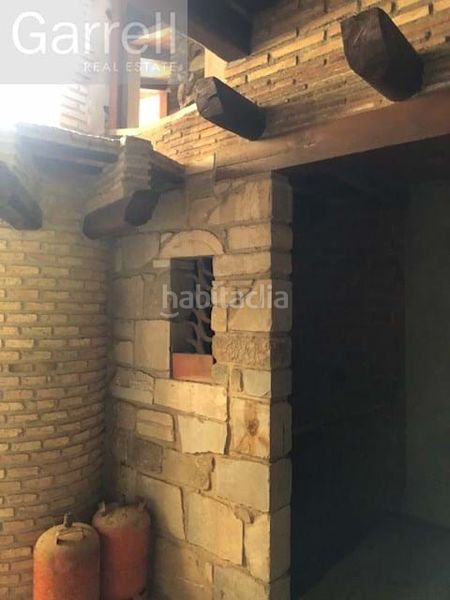Foto 38b2c699-8548-49d4-b325-b464e85ccb3a. Casa adossada a Osor