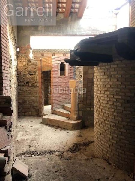 Foto f72c42f6-c3df-499e-84bc-38cf3b978da9. Casa adossada a Osor