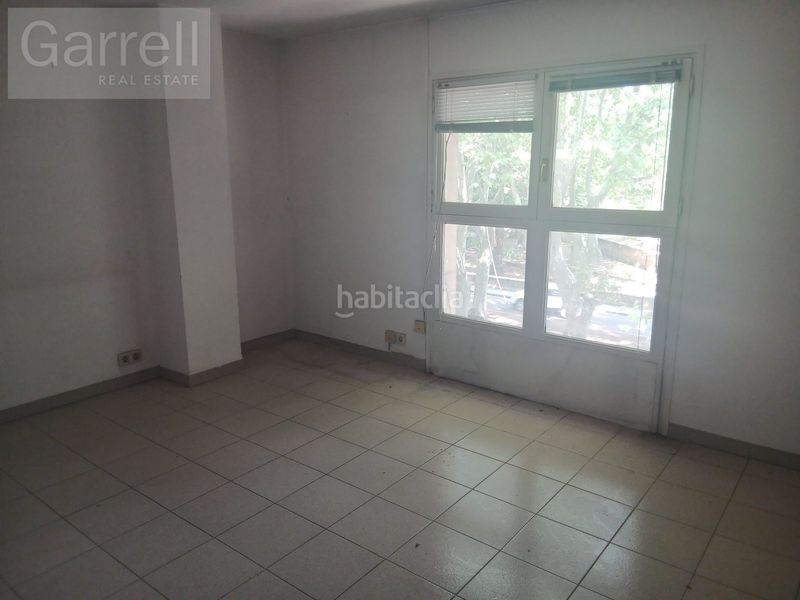 Foto e441bb78-e292-46c5-bc9f-6480df18f598. Casa adossada amb aparcament a Olot