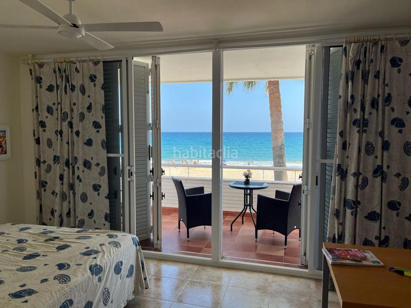 Foto b82fe474-f61d-4e62-b0e7-8ff00396c2a8. Casa fincas eva os presenta esta exclusiva vivienda unifamiliar en primera línea de mar tarragona ubicada en el emblemático en Altafulla