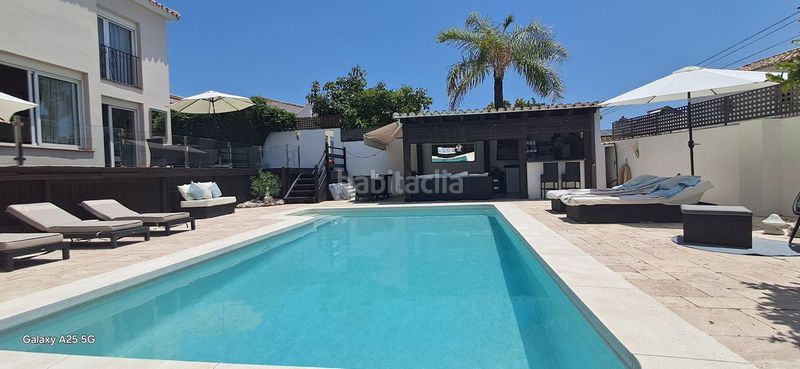 Foto fd3359ba-601e-4789-9472-4d5fa7c45808. Casa amb aparcament piscina a Bello Horizonte - Lindasol Marbella