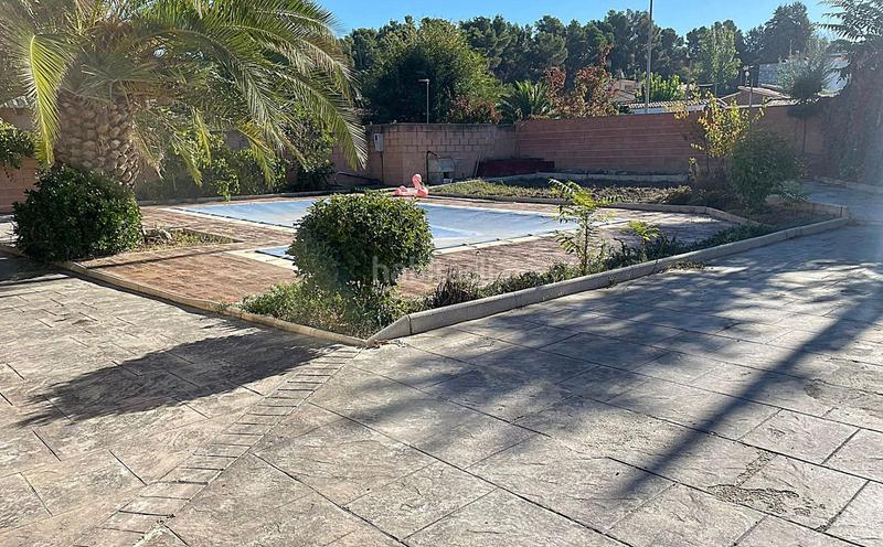 Foto 247247e6-27fc-4586-af10-e55713d90436. Xalet amb calefacció aparcament piscina a Los Villares Arganda del Rey