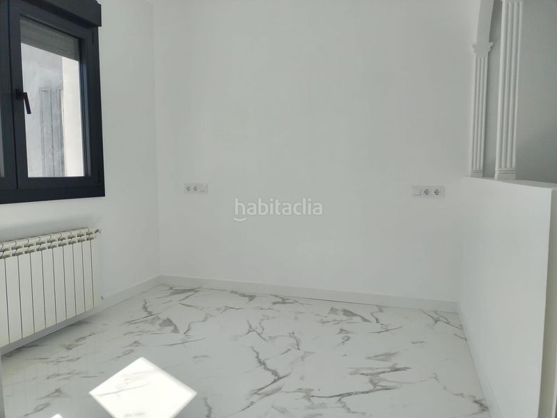 Foto 6d8c85ab-3c35-49dd-a1ba-03b2b1a4530c. Planta baixa amb calefacció a Perlita Arganda del Rey