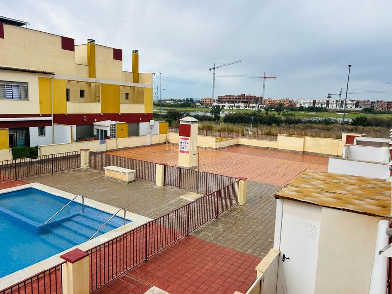 Foto dface9fc-dc61-4c2e-95ef-d9ccfeb6e83b. Casa aparellada amb aparcament piscina a Las Lomas de Rame-Bahía Bella Alcázares (Los)