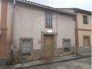 Casa  Cruces. En calera y chozas