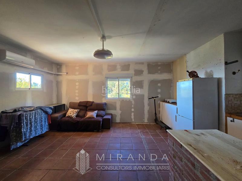 Foto b9fd8a21-d460-42a8-ad66-3a96cfe51593. Chalet with fireplace heating parking pool in Bigues i Riells del Fai