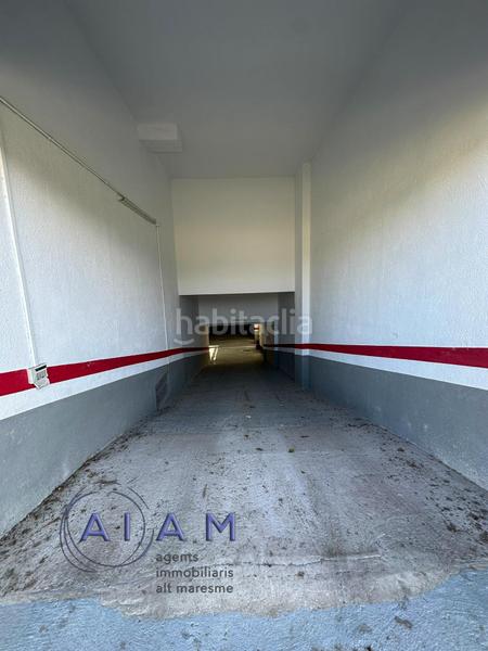 Foto f56cf2ce-866c-44ae-9c07-29889d87607c. Parking voiture dans Centre Pineda de Mar