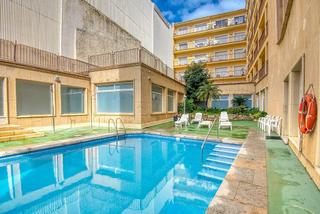 Apartament  Paseo guixols. Exclusivo apartamento con terraza y piscina en passeig del guxo