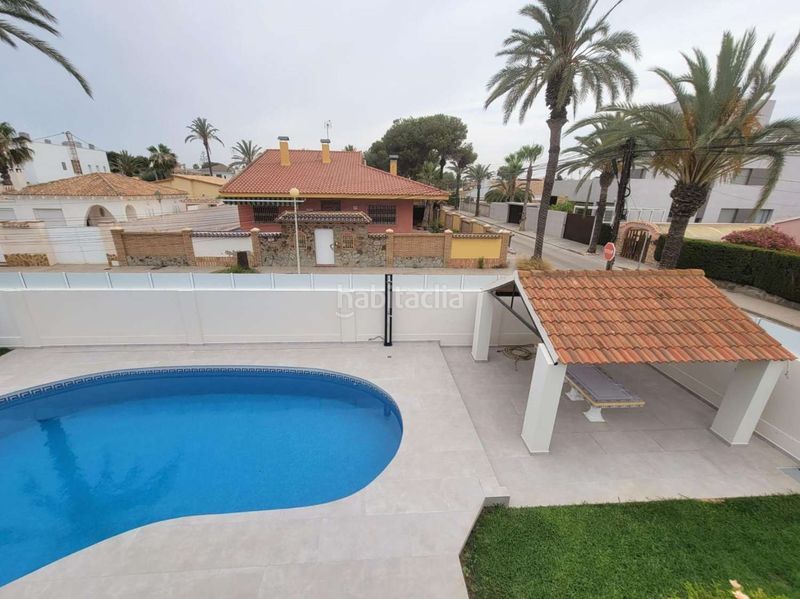 Foto 0b56a215-6b15-41e2-88a1-e61f2c4581fa. Xalet amb calefacció piscina a Cabo Roig Orihuela