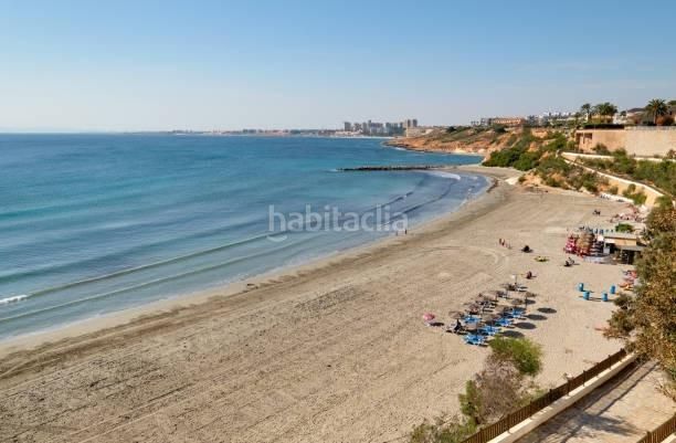 Foto 45e2ccbe-e3b4-4c91-96ac-83982c5e67a0. Xalet amb calefacció piscina a Cabo Roig Orihuela