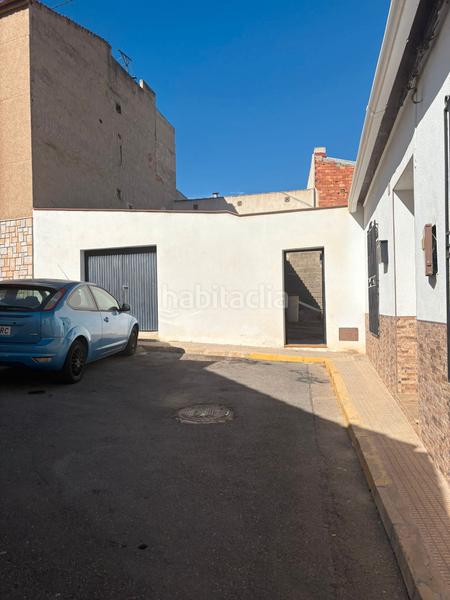 Foto c222fc83-7a9e-49e5-bdf0-139711f84283. Maison avec cheminée dans Bigastro