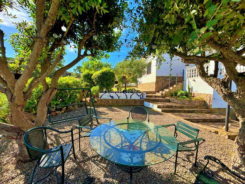 Foto 26c2b86c-f286-4dcf-82ce-eb9faa5a3c68. Chalet avec cheminée parking piscine dans Serra Brava Lloret de Mar