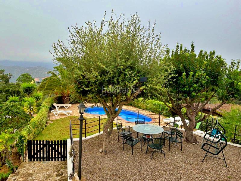 Foto 98823b1a-9e02-4ec8-a4d5-58e510b3ef44. Chalet avec cheminée parking piscine dans Serra Brava Lloret de Mar