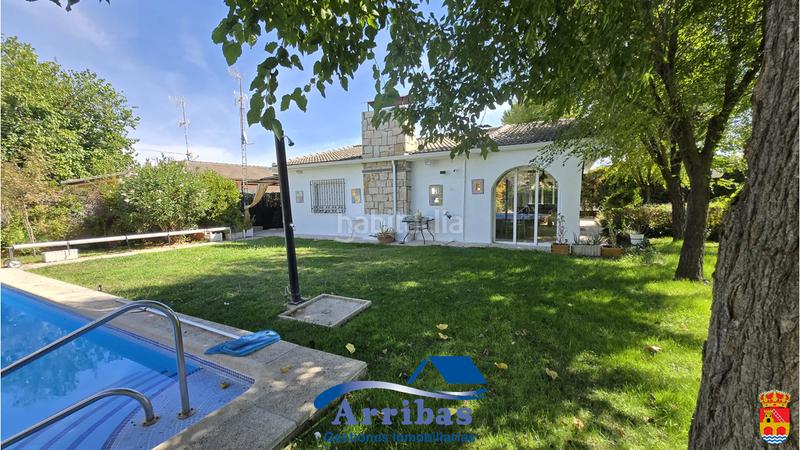 Foto 1a1e8a29-74cd-402a-9e9f-7bc2d1f46634. Chalet with fireplace heating pool in Escalona