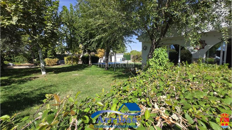 Foto 9f8032c6-0874-4f92-8728-ceee3613b603. Chalet with fireplace heating pool in Escalona