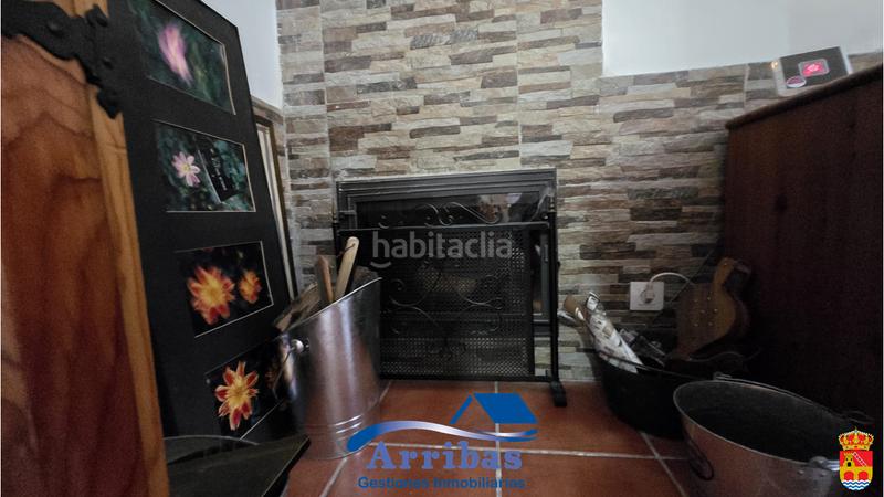 Foto a3b4c288-0647-410a-bccb-4cab231e7371. Chalet with fireplace heating pool in Escalona