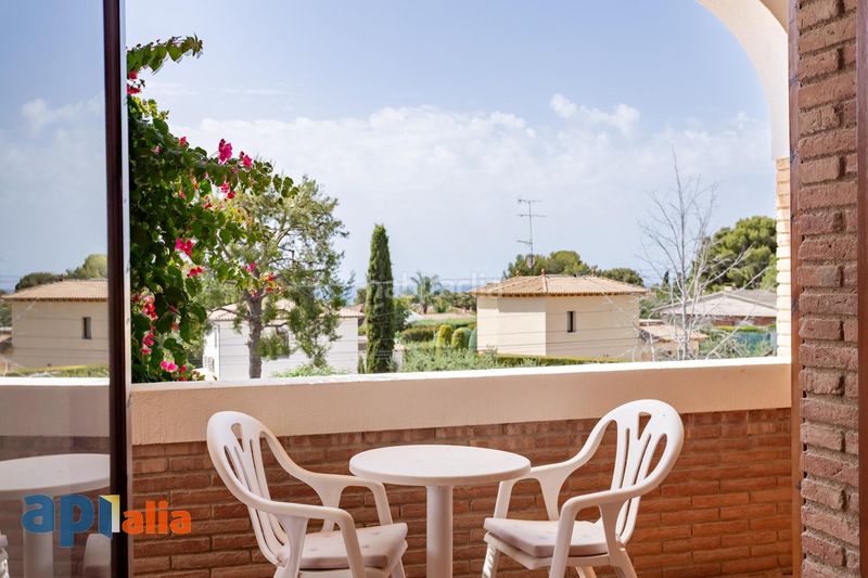 Foto 515bd072-2e05-4ee0-8484-fffc32cea169. Casa adossada amb aparcament piscina a Els Masos - Els Garrofers Coma-ruga