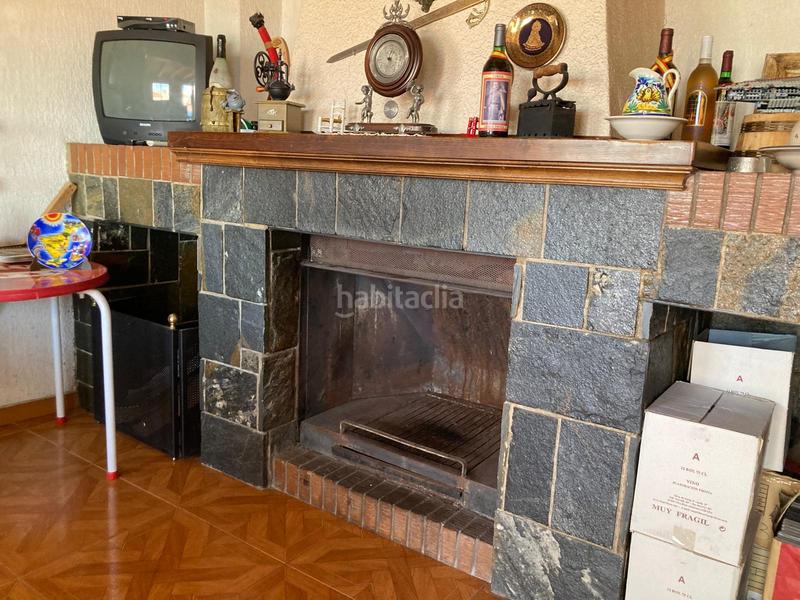 Foto b000d049-fdb4-4d1c-9d3e-32112906f36a. Casa amb xemeneia calefacció aparcament a El Rabal Villena