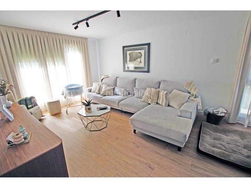 Foto 67cbe7ed-3572-4f02-a007-bea34ffb9348. Casa aparellada amb calefacció aparcament piscina a Guadalajara