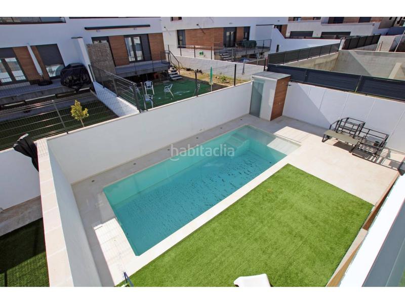 Foto 6da6da48-82d1-4f35-bb0b-54b5b3abc788. Casa aparellada amb calefacció aparcament piscina a Guadalajara