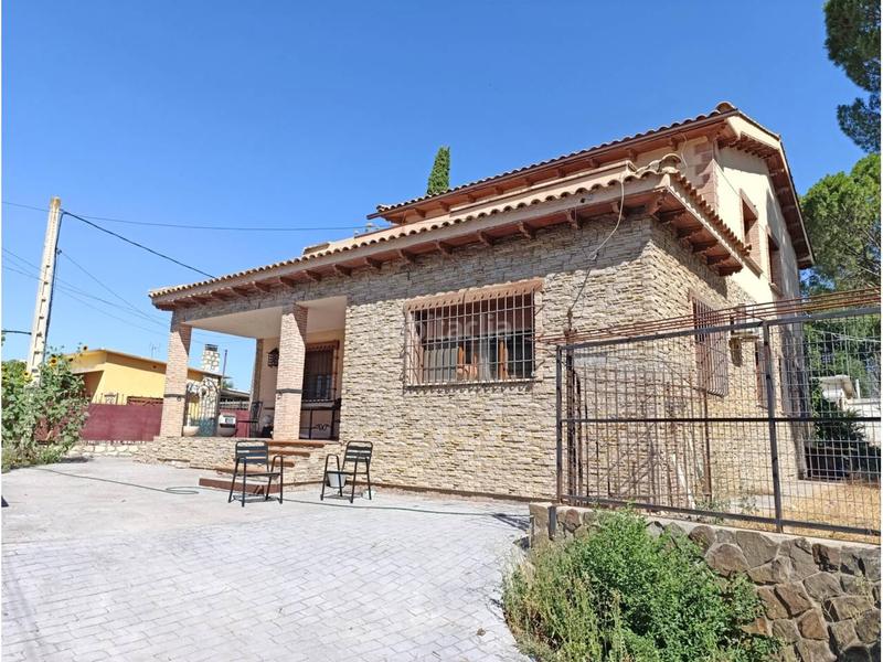 Foto b2ebe11b-1244-4ae0-98fa-1eb7b1b5b5bf. Chalet  unifamiliar en venta en Villamanrique de Tajo