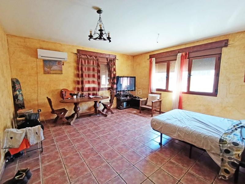 Foto dccf3417-1036-4394-9104-ec8d3c68713b. Chalet  unifamiliar en venta en Villamanrique de Tajo